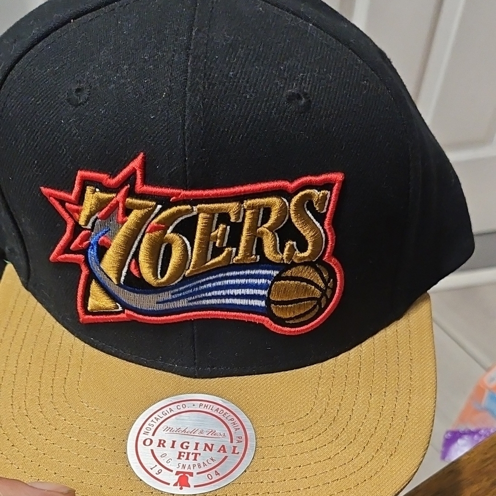 Mitchell & Ness 76ers Black and Gold Cap
